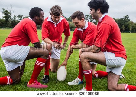 stock-photo-rugby-players-discussing-tactics-before-match-at-the-park-320409086