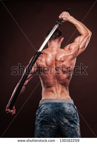 stock-photo-shirtless-young-man-posing-with-katana-sword-130162259